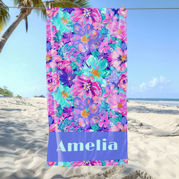 a beach towel with a name on it